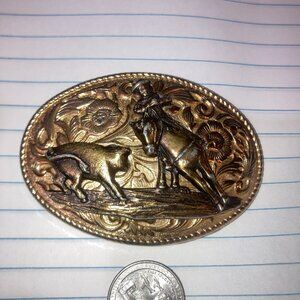 Cowboy Riding Horse  Belt Buckle